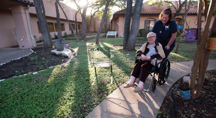 Hospice nurse and patient