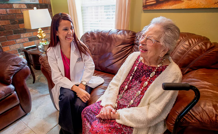 Hospice nurse visiting patient