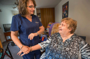 patient and nurse discuss determining eligibility for hospice care