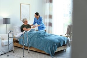 patient receives comfort from nurse while discussing the hospice care admissions process and timeline