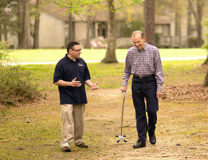 man walking with patient in palliative care