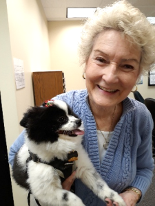 Linda Schatzle and her small black and white pomeranian, suzy